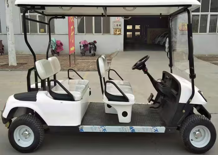 electric golf cart staged after trailer loading and site access planning review