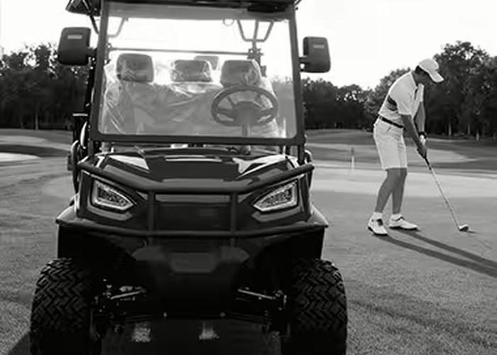 electric golf cart carrying passenger and housekeeping load on property route
