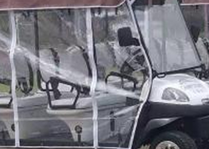 A type electric golf cart prepared for buyer evaluation on a golf course route